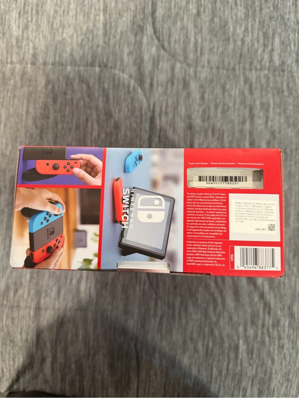 Nintendo Switch Console with Blue and Red Joy‑Con Controllers